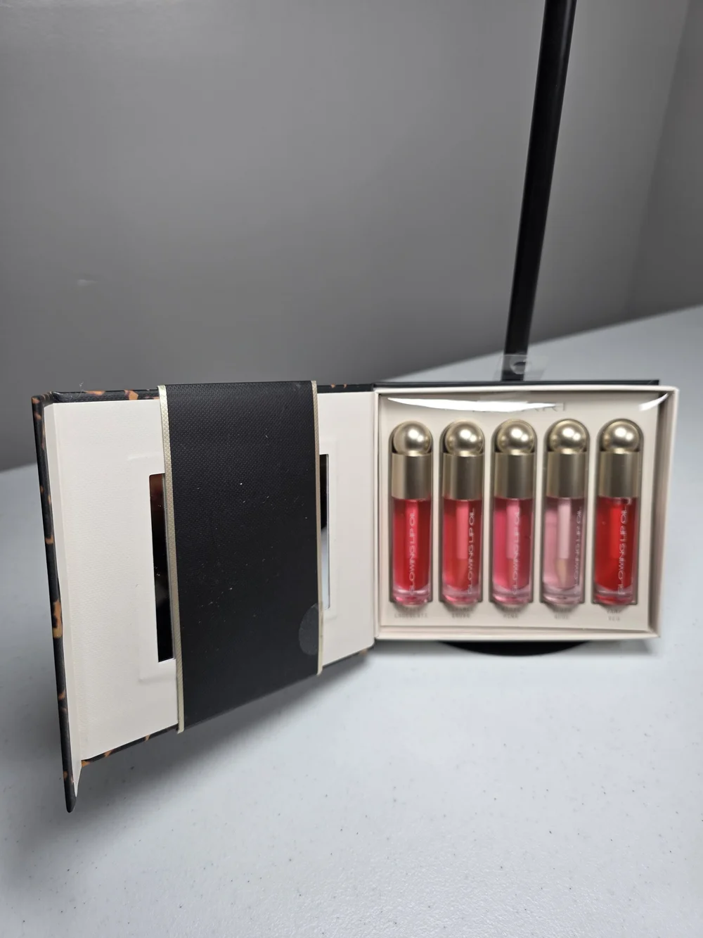 Tahari Glowing Lip Oil Set — Pick 1
